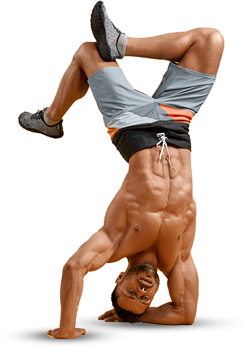 Fit male doing a hand stand